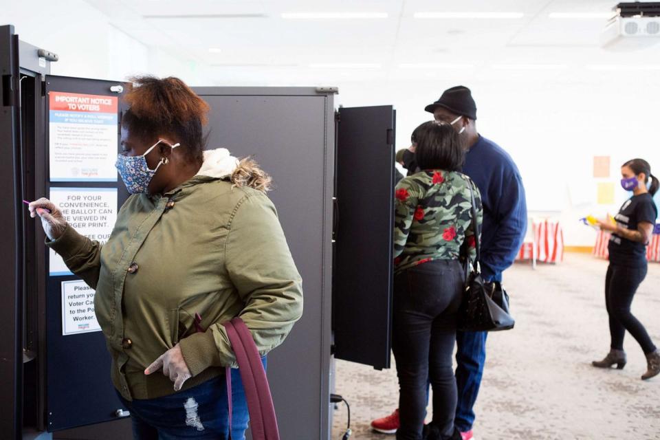 PHOTO: Fulton County voter Sharron Lee casts her ballot at the Metropolitan Library, Nov. 3, 2020 in Atlanta. (Jessica Mcgowan/Getty Images)