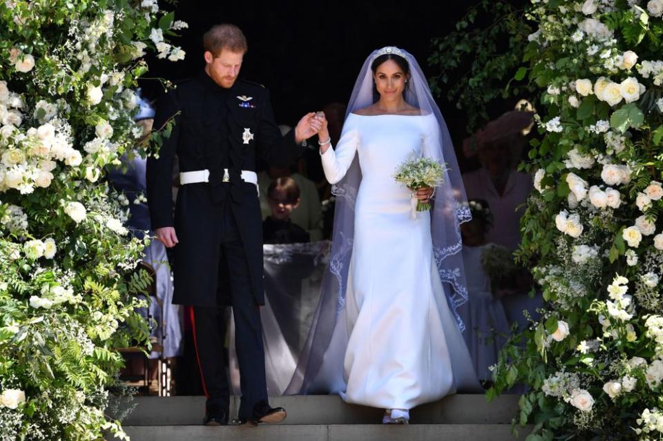 Meghan and Harry at George's Chapel, Windsor Castle, in Windsor, on May 19, 2018, after their wedding ceremony. | BEN STANSALL/AFP/Getty Images