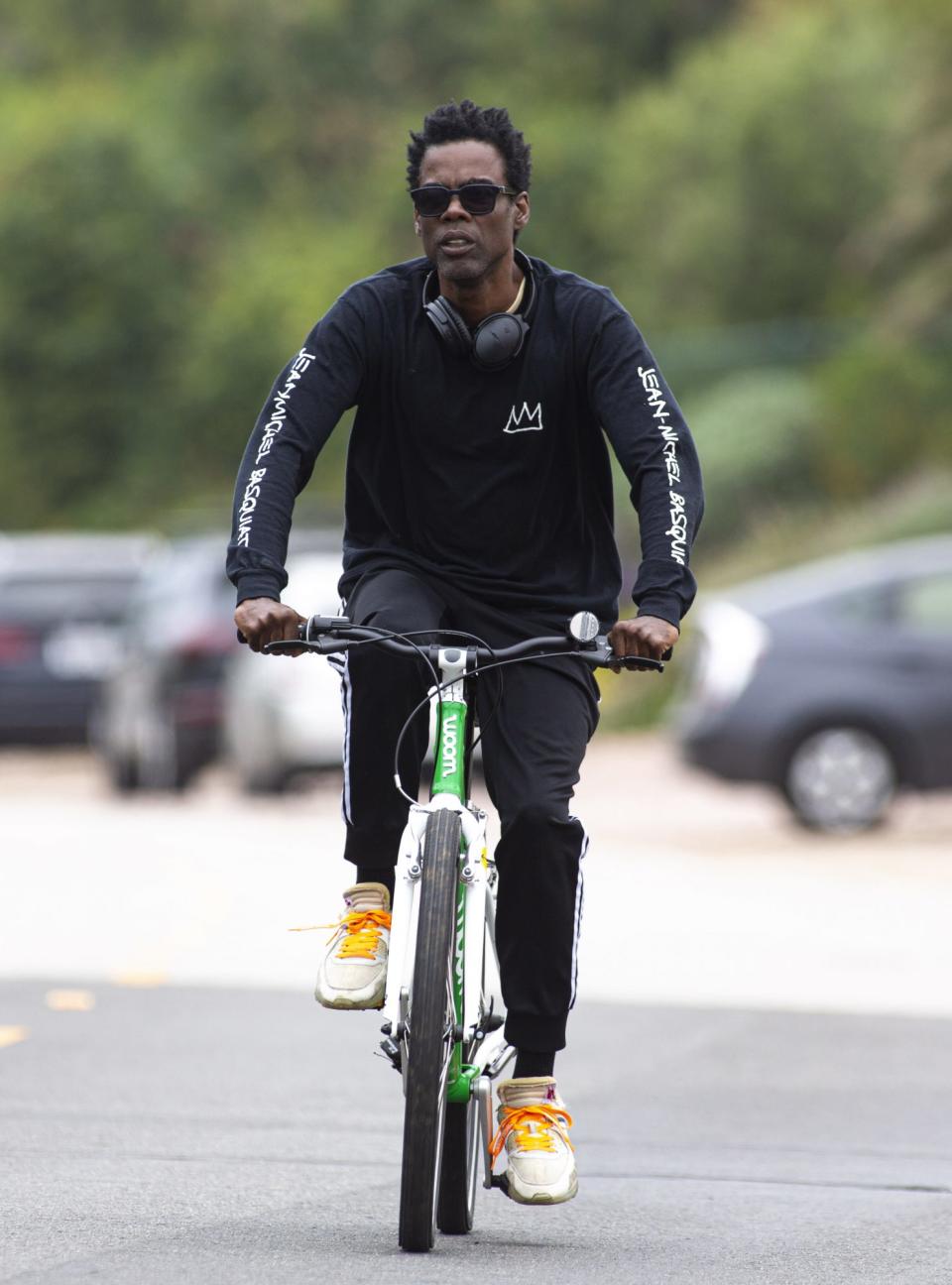 <p>Chris Rock spends his Father's Day on a solo bike ride around Malibu. </p>