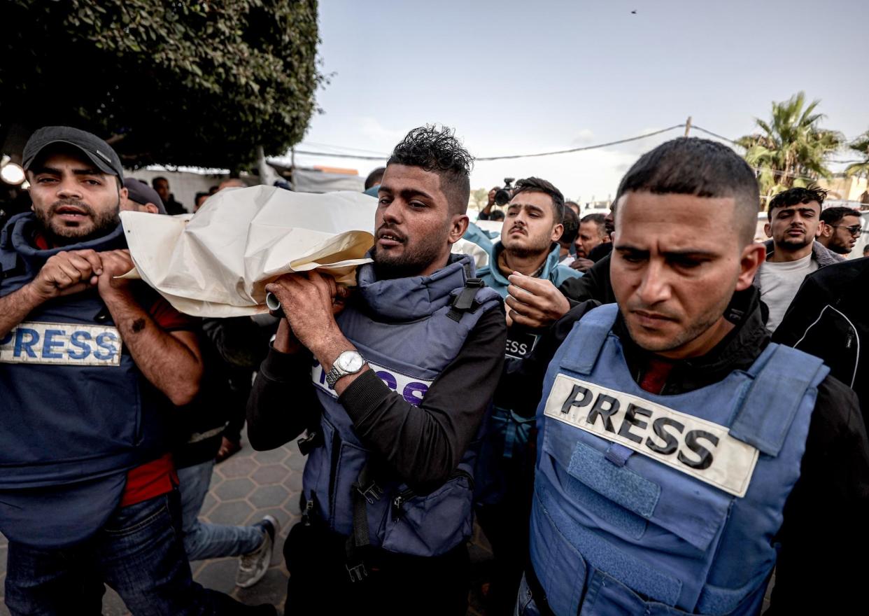 <span>Funeral ceremony for the Palestinian journalists Sari Mansour and Hasona Saliem after they were killed in Gaza in November last year.</span><span>Photograph: Anadolu Agency/Anadolu/Getty Images</span>