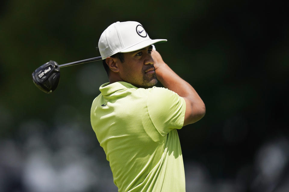 Tony Finau drives off the second tee during the final round of the Rocket Mortgage Classic golf tournament, Sunday, July 31, 2022, in Detroit. (AP Photo/Carlos Osorio)