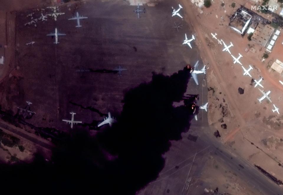 Maxar closeup satellite imagery of the fires and smoke plumes coming from burning airplanes at the Khartoum international Airport, Sudan.