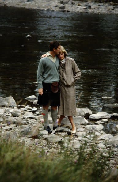 <p>The pair ended their trip at Balmoral Castle in Scotland. Here, they embrace by the River Dee.</p>