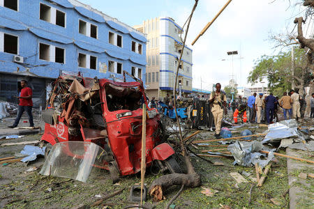 Somali security forces secure the scene after an explosion went off outside Weheliye Hotel in Maka al Mukarama street in Mogadishu, Somalia March 22, 2018. REUTERS/Feisal Omar