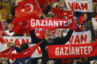 <p>Supporters of the ruling AK Party wave Turkish flags during a campaign meeting for the April 16 constitutional referendum, in Ankara, Turkey, February 25, 2017. (Umit Bektas/Reuters) </p>