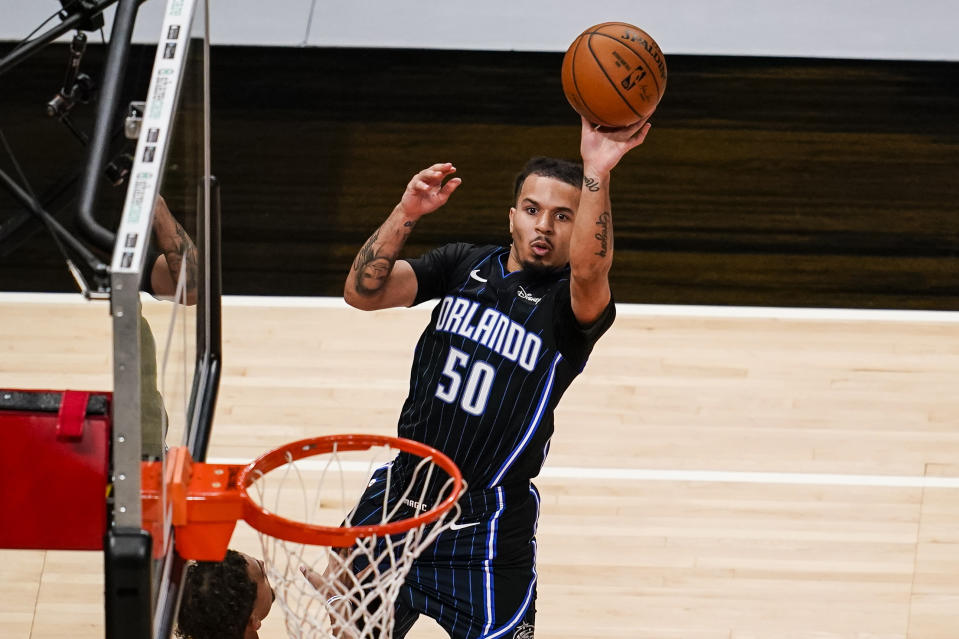 Dec 11, 2020; Atlanta, Georgia, USA; Orlando Magic guard Cole Anthony (50) shoots against the Atlanta Hawks during the second half at State Farm Arena.