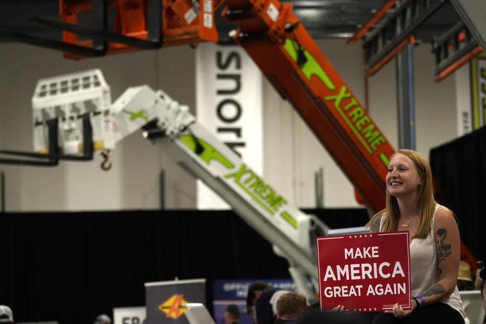 A supporter waits for President Donald Trump to speak at a rally at Xtreme Manufacturing, Sunday, Sept. 13, 2020, in Henderson, Nev. (AP Photo/Andrew Harnik)