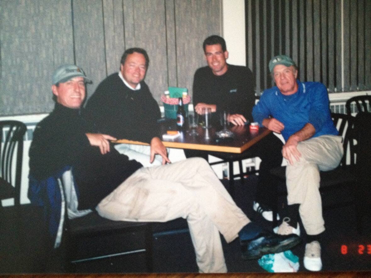 From left, David Reid, Val Streeter, Jeremy Pearson and the late actor James Caan at Riverside Golf Club in Rothesay in 2002. Caan was in Saint John shooting a movie and struck up a friendship with the three local men on the golf course. (Submitted by David Reid - image credit)