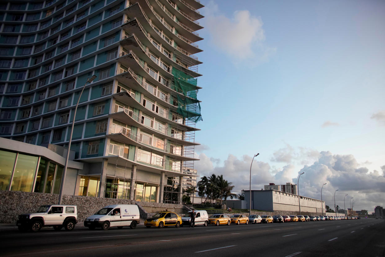 Cars line up for gas at the seafront Malecon in Havana, Cuba, September 17, 2019. Picture taken on September 17, 2019. REUTERS/Alexandre Meneghini