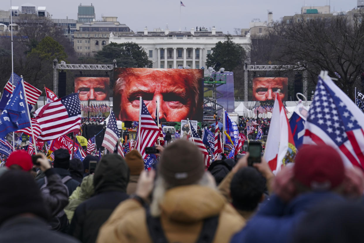 In this Jan. 6, 2021 file photo, Trump supporters participate in a rally in Washington prior to the deadly assault on the U.S. Capitol. (John Minchillo/AP)