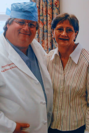 Darlene Coker is shown with her thoracic surgeon David Sugarbaker in this undated handout family photograph obtained by Reuters August 15, 2018 in California, U.S. Cady Evans/Handout via REUTERS