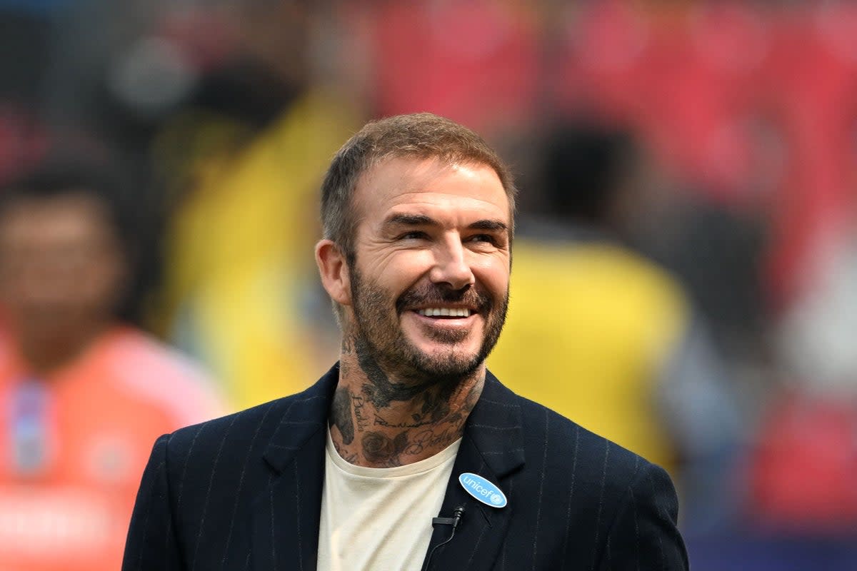 David Beckham says the moment his father congratulated him – ‘the first time he turned around to me and said: “You’ve made it, boy”’ – was after a friendly against France in which he didn’t score  (AFP via Getty Images)