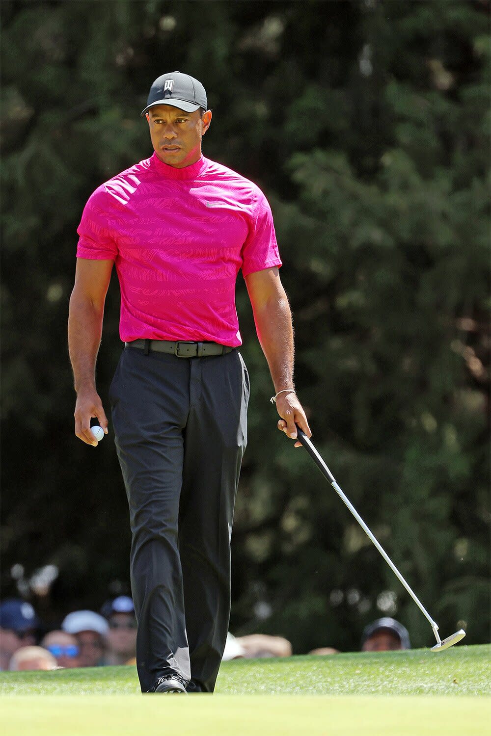 Tiger Woods lines up a putt on the sixth green during the first round of the Masters at Augusta National Golf Club on April 07, 2022