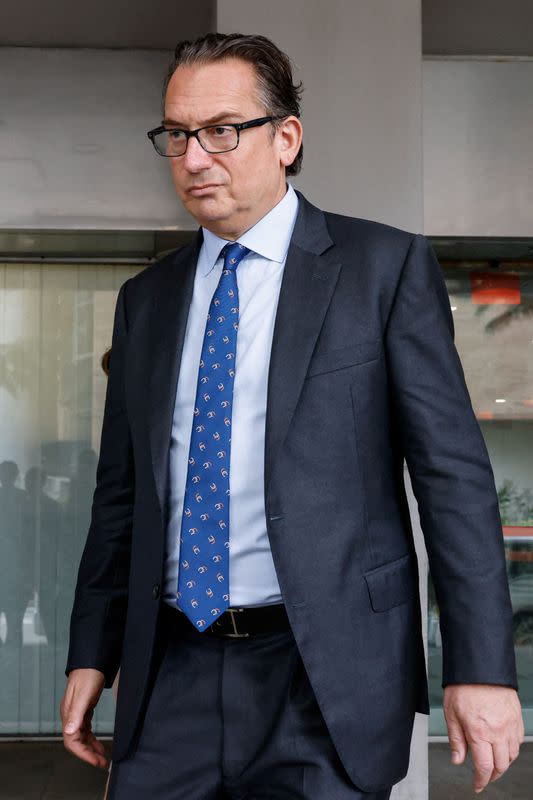 Simon Sadler, chief investment officer and founder of Segantii Capital Management, arrives at the Eastern Magistrates' Courts in Hong Kong