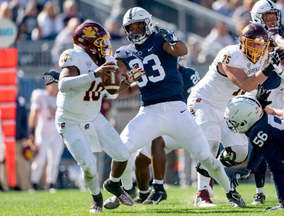 Penn state defensive end Dani Dennis-Sutton pressures and sacks Central Michigan quarterback Daniel Richardson during the game on Saturday, Sept. 24, 2022.