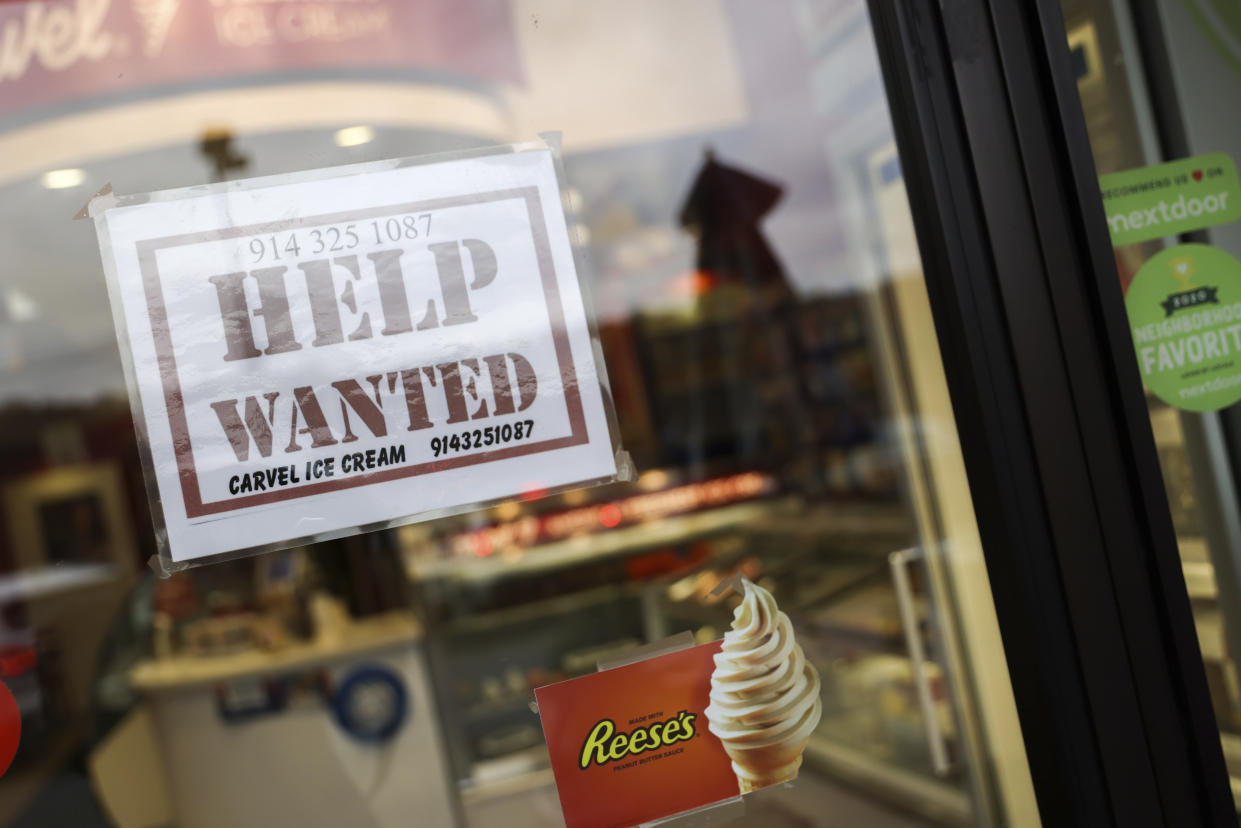 A help wanted sign in a storefront, Tuesday, Nov. 1, 2022, in Bedford, N.Y. The Federal Reserve may reach a turning point this week as it announces what's expected to be another substantial three-quarter-point hike in its key interest rate. The Fed's hikes have already led to much costlier borrowing rates, ranging from mortgages to auto and business loans. (AP Photo/Julia Nikhinson)