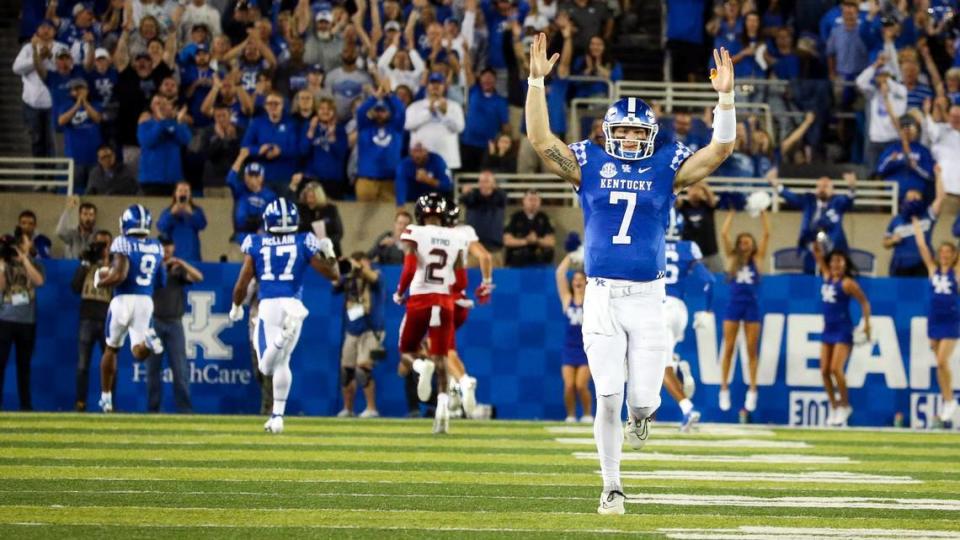 Kentucky quarterback Will Levis (7) celebrates a 69-yard touchdown pass to wide receiver Tayvion Robinson (9) in the second quarter of Saturday’s win against Northern Illinois at Kroger Field.