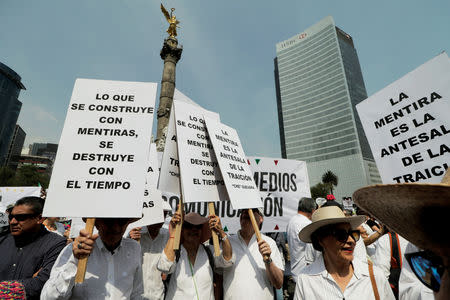 Demonstrators take part in a march against the government of Mexico's President Andres Manuel Lopez Obrador in Mexico City, Mexico May 5, 2019. REUTERS/Luis Cortes