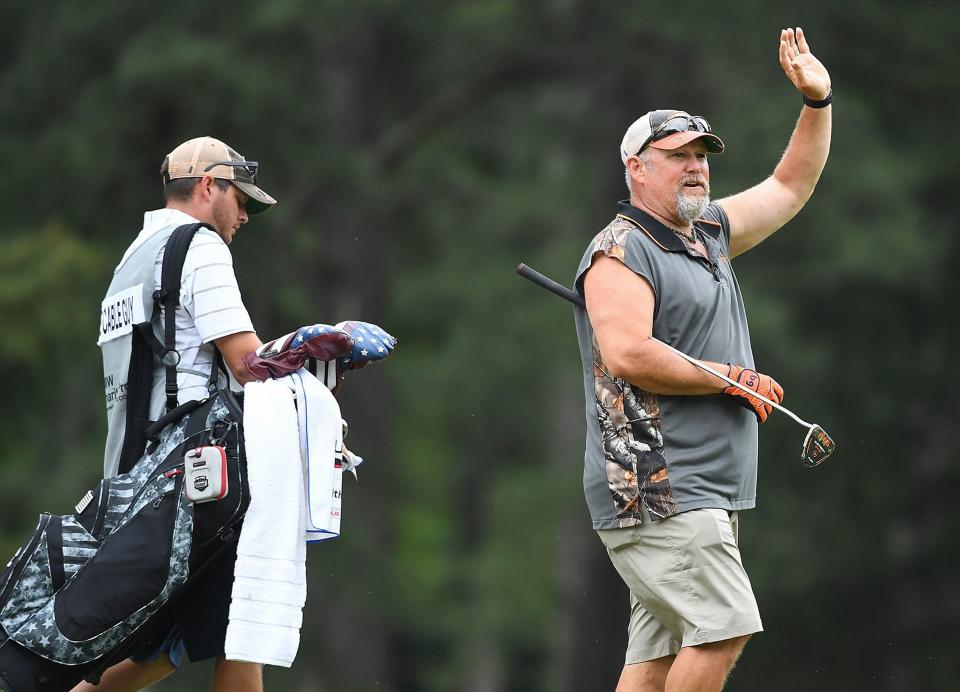Larry The Cable Guy hams it up during the first day of the BMW Charity Pro-Am 