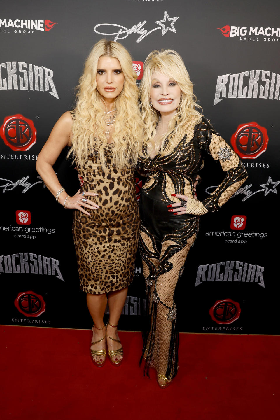 NASHVILLE, TENNESSEE - NOVEMBER 16:  (EDITORS NOTE: This image has been retouched.) (L-R) Jessica Simpson and Dolly Parton attend Dolly Parton's Rockstar VIP Album Release Party with American Greetings on November 16, 2023 in Nashville, Tennessee. (Photo by Jason Kempin/Getty Images for American Greetings)