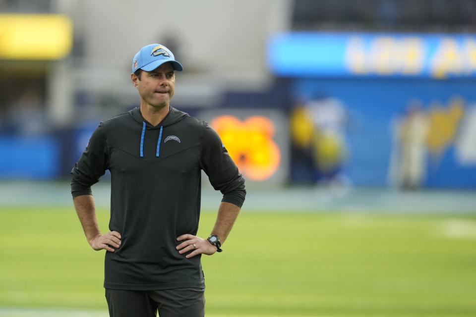 Chargers coach Brandon Staley watches his players warm up before a win over the Rams on Jan. 1.