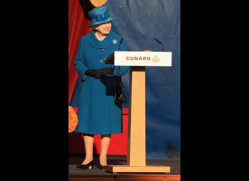 Queen Elizabeth II smiles as she names Cunard's new cruise-liner Queen Elizabeth II.     <em>Photo by Chris Jackson/Getty Images</em>