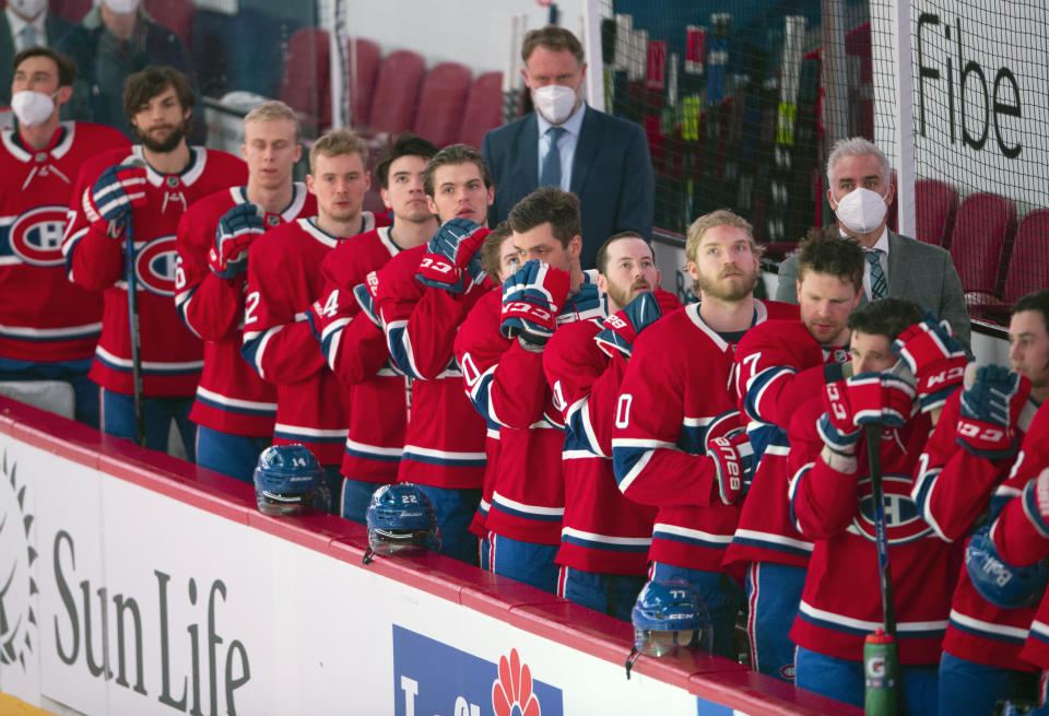 Montreal Canadiens stand for the national anthem before their final NHL hockey game of the season against the Edmonton Oilers Wednesday, May 12, 2021 in Montreal. (Ryan Remiorz/Canadian Press via AP)