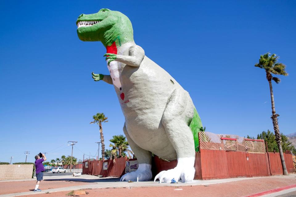 Following the passing of 'Pee-wee's Big Adventure' star, Paul Reubens, the famous Mr. Rex at the Cabazon Dinosaurs features a fresh coat of paint in tribute to the actor in Cabazon, Calif., on Wednesday, August 2, 2023. The Cabazon Dinosaurs were featured in the film with Reubens.