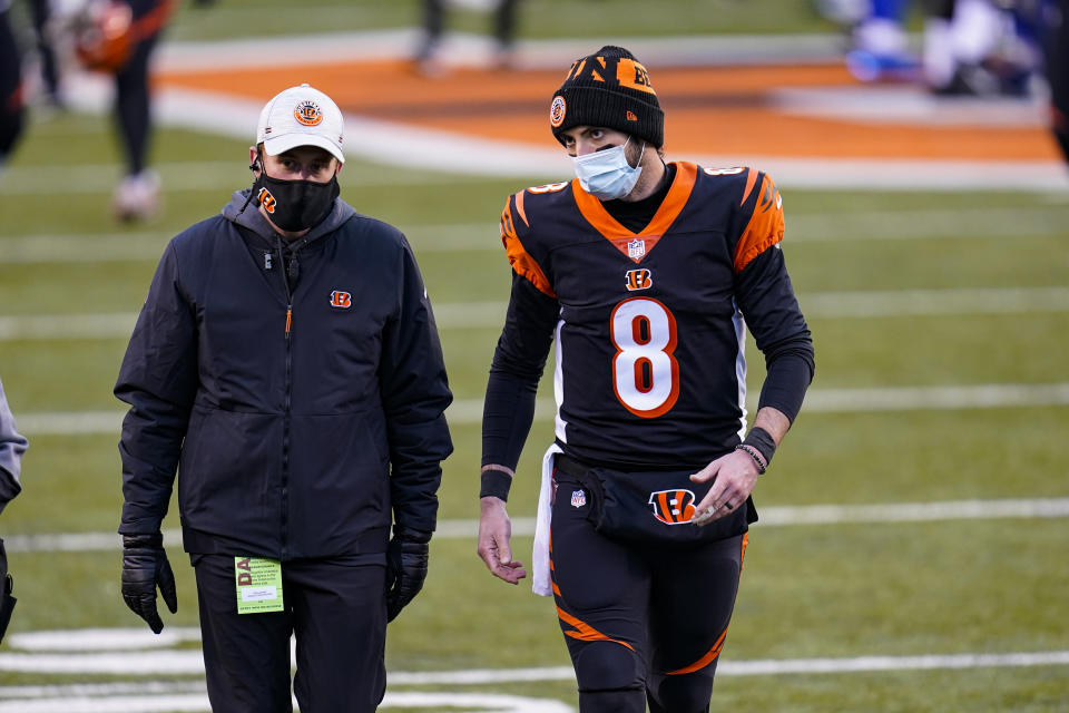 Cincinnati Bengals quarterback Brandon Allen (8) leavers the field following an NFL football game against the Dallas Cowboys in Cincinnati, Sunday, Dec. 13, 2020. The Cowboys defeated the Bengals 30-7. (AP Photo/Bryan Woolston)