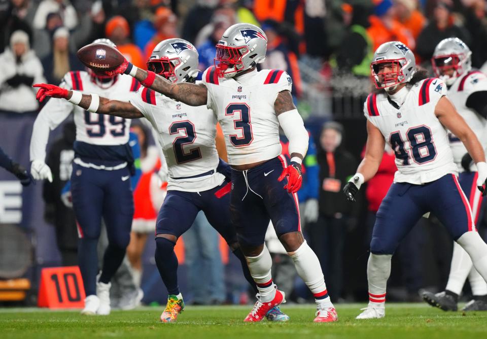 Dec 24, 2023; Denver, Colorado, USA; New England Patriots linebacker Mack Wilson Sr. (3) reacts to a defensive play in the first quarter against the Denver Broncos at Empower Field at Mile High. Mandatory Credit: Ron Chenoy-USA TODAY Sports