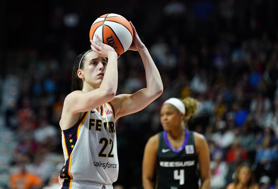 Indiana Fever guard Caitlin Clark (22) shoots a free throw against the Connecticut Sun in the second quarter at Mohegan Sun Arena on May 14, 2024, in Uncasville, Connecticut, USA.