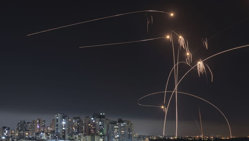 Israel’s Iron Dome missile defense system fires interceptors at rockets launched from the Gaza Strip, in Ashkelon, southern Israel. Thursday, May 11, 2023. 