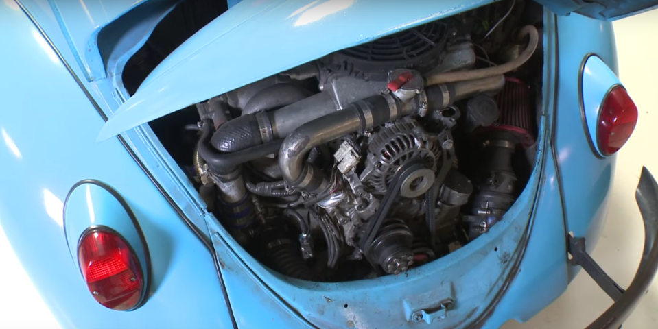 <p>Owing to their ubiquitousness, people have stuffed pretty much every engine imaginable into Beetles over the years. But this <a href="https://www.roadandtrack.com/car-culture/videos/a30212/a-rotary-turbo-vw-beetle/" rel="nofollow noopener" target="_blank" data-ylk="slk:13B-rotary powered Beetle;elm:context_link;itc:0;sec:content-canvas" class="link ">13B-rotary powered Beetle</a> might be the coolest. This one makes at least 250 horsepower and runs the quarter mile in the 10s.</p>