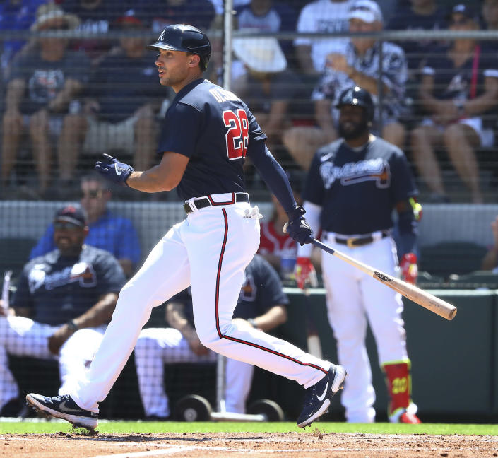 Atlanta Braves first baseman Matt Olson hips an RBI single against the Minnesota Twins during the third inning of a spring training baseball game Friday, March 18, 2022, in North Port, Fla. (Curtis Compton/Atlanta Journal-Constitution via AP)