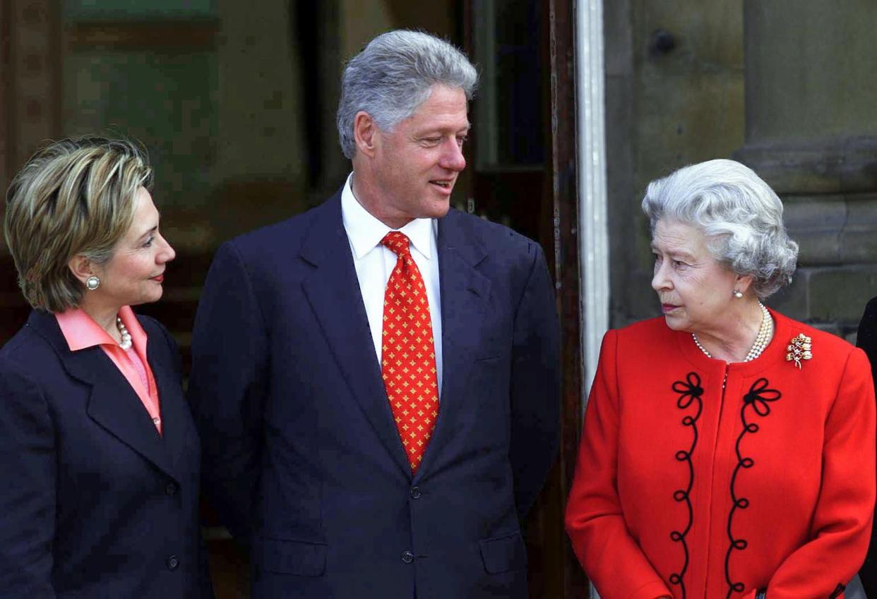 U.S. President Bill Clinton (42nd president) and First Lady Hillary (l) talk with Britain's Queen Elizabeth II at Buckingham Palace in London on Dec. 14, 2000.