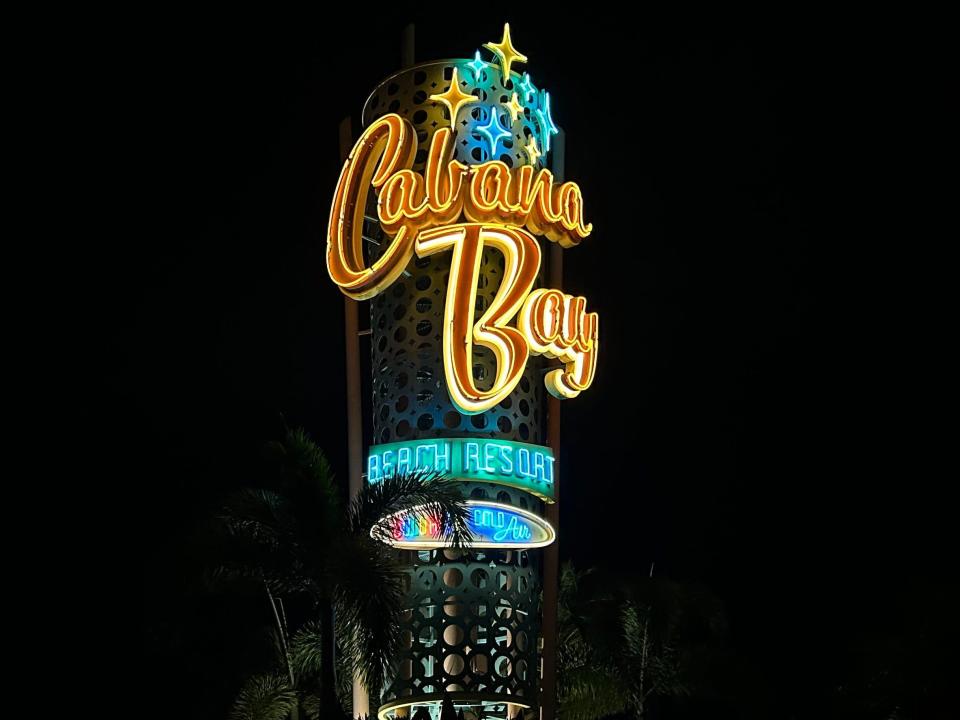 The sign for the Cabana Bay Beach Resort in Orlando. It is nighttime.