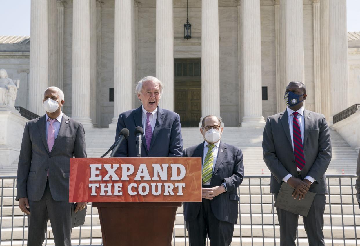 From left, Rep. Hank Johnson, D-Ga., Sen. Ed Markey, D-Mass., House Judiciary Committee Chairman Jerrold Nadler, D-N.Y., and Rep. Mondaire Jones, D-N.Y., hold a news conference outside the Supreme Court to announce legislation to expand the number of seats on the high court, on Capitol Hill in Washington, Thursday, April 15. 