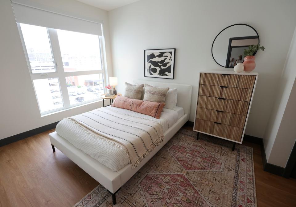 A bedroom is pictured in a two-bedroom unit in The Aster, a three-building development that includes low-income housing, commercial and public spaces, in Salt Lake City on Tuesday, May 2, 2023. | Kristin Murphy, Deseret News