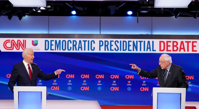 Democratic U.S. presidential candidates Senator Bernie Sanders and former Vice President Joe Biden at the 11th Democratic candidates debate of the 2020 U.S. presidential campaign in Washington