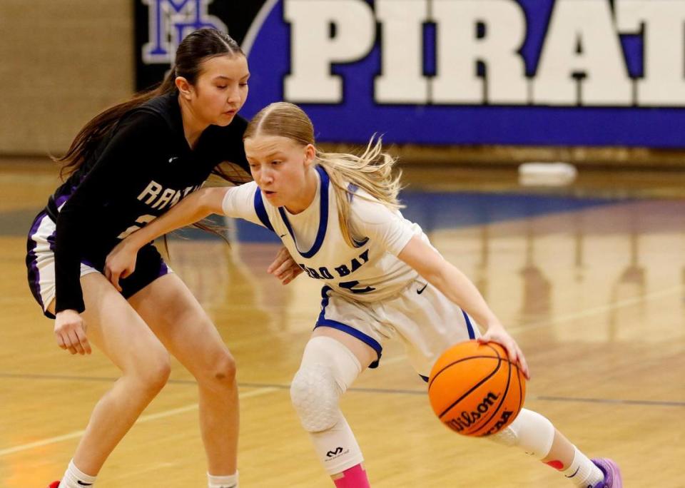 Morro Bay High School girls basketball team beats Rancho Cucamunga 49 - 29 in the CIF state playoffs at Morro Bay High School, Tuesday, Feb. 27, 2024. Zoey Fitzwater (2) defends the ball against Rancho Cucamunga’s Audrina Felix (24).