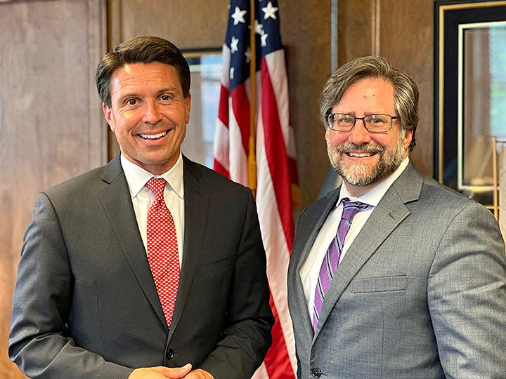 Ashland Mayor Matt Miller, left, welcomes Ashland University's new president, Jon Parrish Peede.