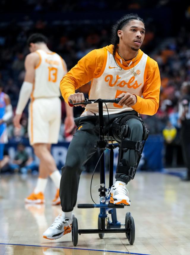 Tennessee guard Zakai Zeigler (5) with his team before a second round SEC Men’s Basketball Tournament game against Mississippi at Bridgestone Arena in Nashville, Tenn., Thursday, March 9, 2023.