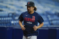 Boston Red Sox pitcher Hirokazu Sawamura runs during the team's AL Division Series baseball practice Wednesday, Oct. 6, 2021, in St. Petersburg, Fla. The Tampa Bay Rays play the Red Sox in the best-of-five series which starts Thursday. (AP Photo/Chris O'Meara)