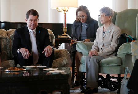 Sakie Yokota (R), mother of Megumi Yokota who was abducted by North Korea agents at age 13 in 1977, meets U.S. ambassador to Japan William Hagerty in Tokyo, Japan, April 10, 2018. REUTERS/Kim Kyung-Hoon