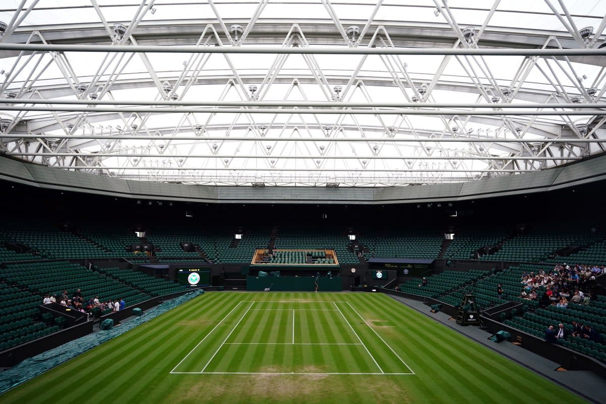 The roof over centre court at Wimbledon was closed for the first time on this day in 2009 (PA Archive)