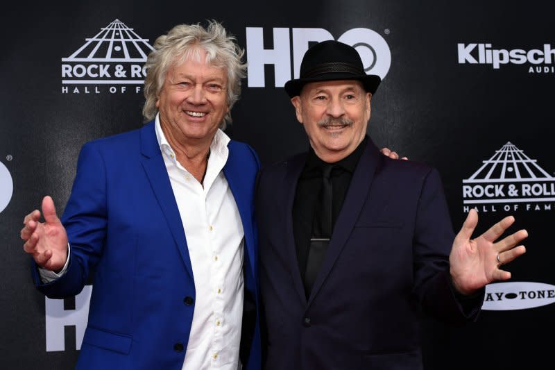 John Lodge, left, and Mike Pinder of Moody Blues pose for a photo on the red carpet at the 33rd annual Rock and Roll Hall of Fame induction ceremonies in 2018. Pinder notably did not speak at all during the ceremony, leading some fans to speculate that he disapproved of the Hall, but Pinder said he just thought the ceremony had gone on for too long. File Photo by Scott McKinney/UPI
