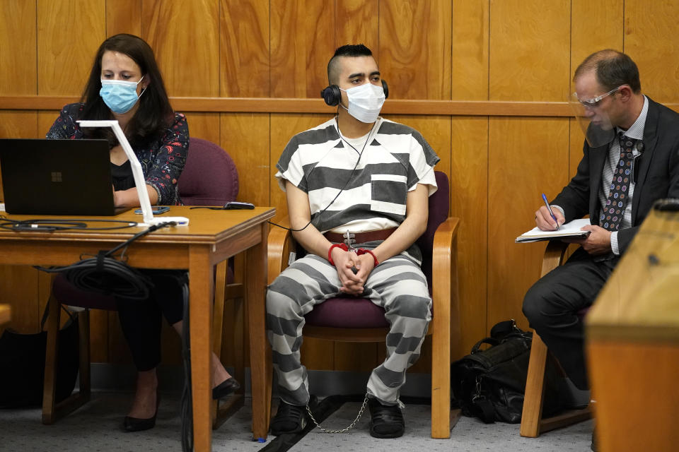 Cristhian Bahena Rivera listens to proceedings during his sentencing, Monday, Aug. 30, 2021, at the Poweshiek County Courthouse in Montezuma, Iowa. Rivera was sentenced to life in prison for the stabbing death of college student Mollie Tibbetts, who was abducted as she was out for a run near her small eastern Iowa hometown in July of 2018. (AP Photo/Charlie Neibergall, pool)