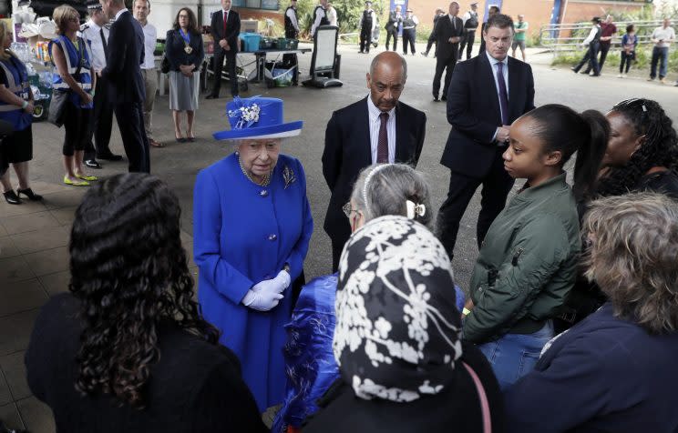 The Queen meeting people affected by the tragedy on Friday (Rex)