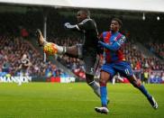 Football Soccer - Crystal Palace v Chelsea - Barclays Premier League - Selhurst Park - 3/1/16 Chelsea's Kurt Zouma in action with Crystal Palace's Wilfried Zaha Action Images via Reuters / John Sibley Livepic