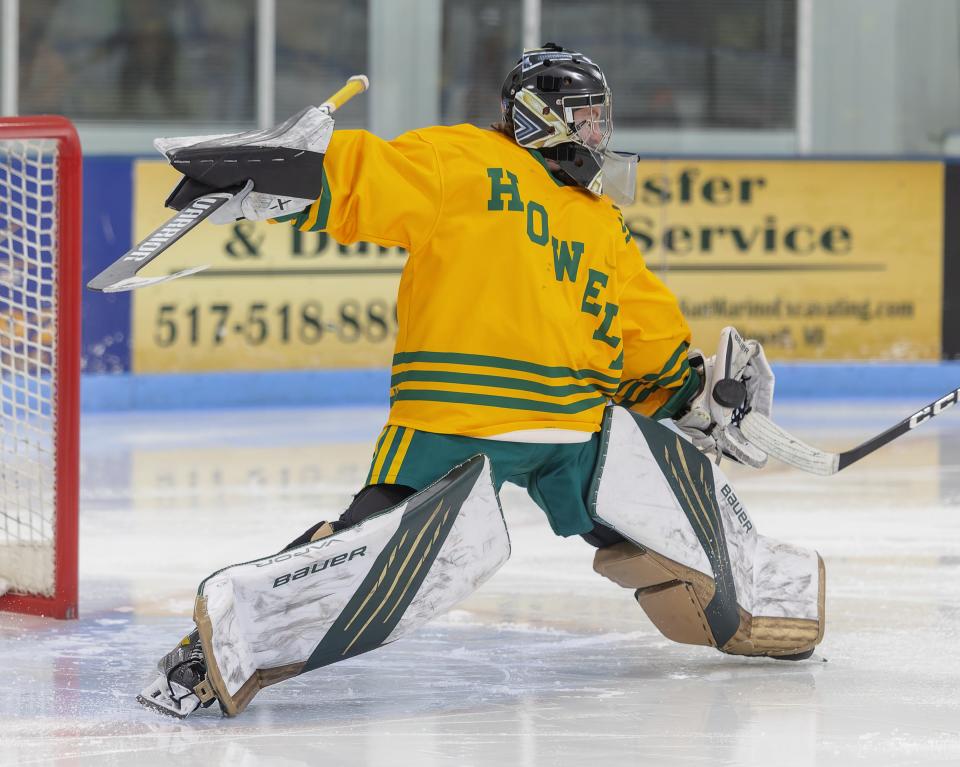 Howell's Alex Herter makes one of his 30 saves in a 5-0 loss to Hartland on Wednesday, Jan. 11, 2023 at 140 Ice Den.